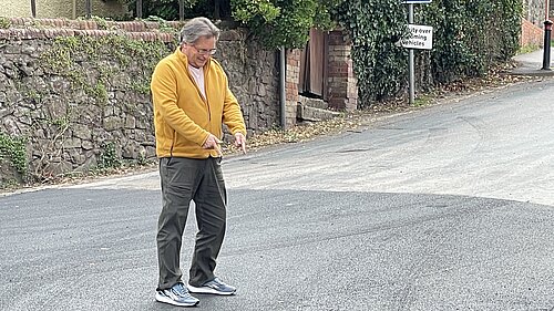 "Well done Frank." Mark Wooding inspects the resurfaced road.