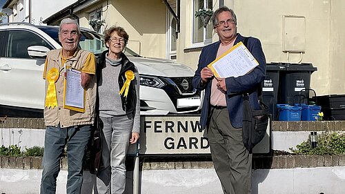 Cllrs. Frank and Natalia Letch and Mark Wooding collect signatures in Copplestone